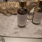 Deadly Attraction Hoodoo Conjure Oil by Rich Bitch Conjure, a spiritual oil for magnetism, love, money, and opportunity rituals.