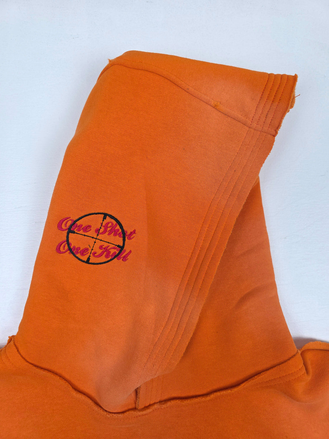 Orange Trophy Pullover Hoodie by Any Means Necessary Clothing, featuring a comfortable fit and stylish design.