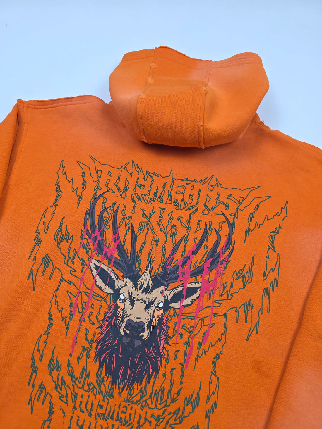Orange Trophy Pullover Hoodie from Any Means Necessary Clothing, front view showing the design and comfortable fit.
