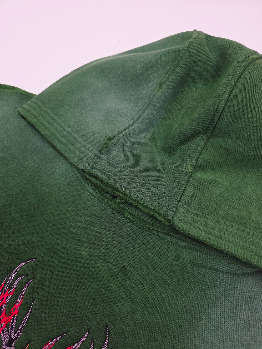 Green Trophy Pullover Hoodie by Any Means Necessary Clothing, featuring a comfortable fit and stylish design.