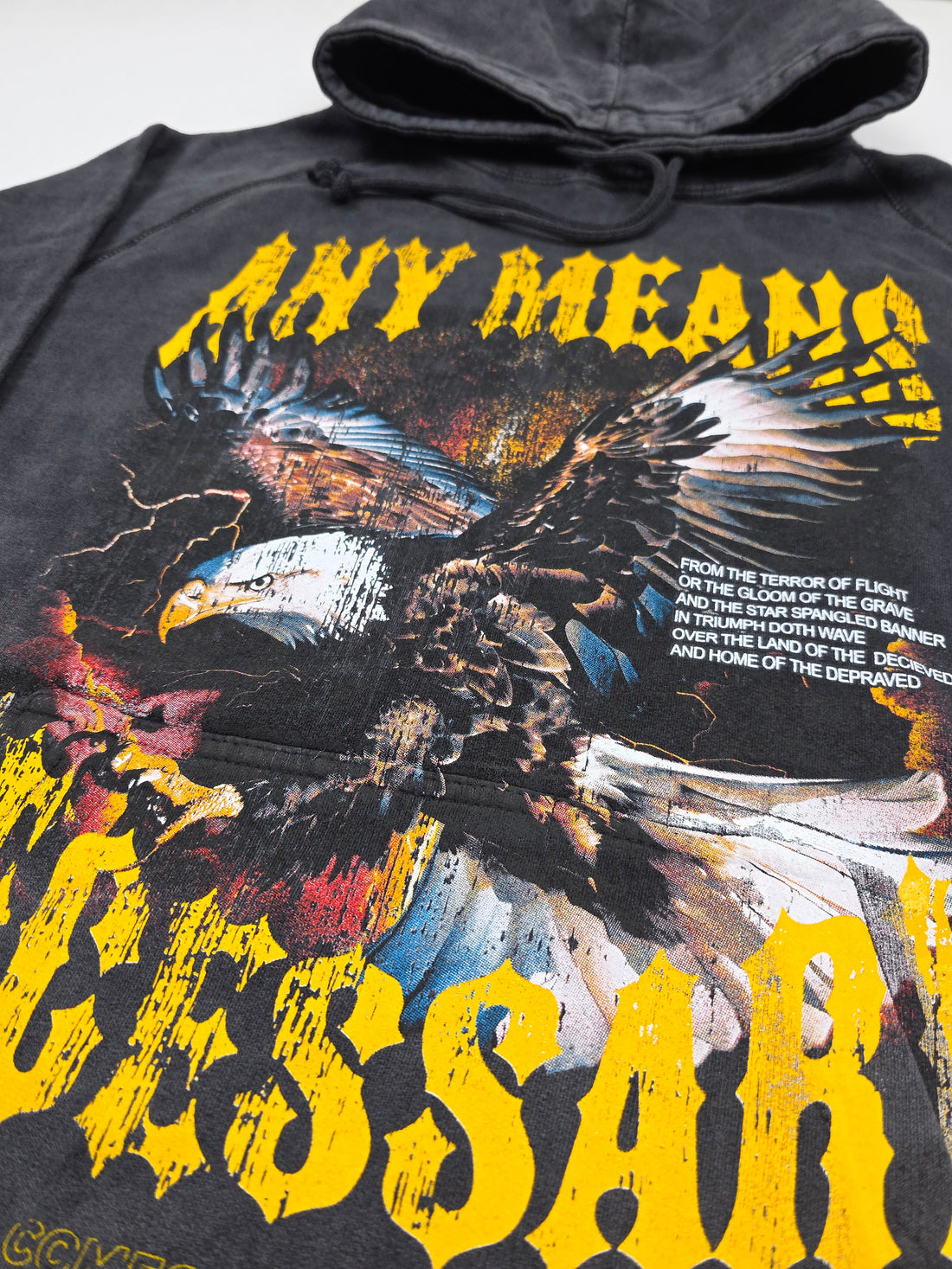 Black Depraved Pullover Hoodie from Any Means Necessary Clothing featuring a vintage design and comfortable fit.