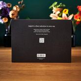 August Uncommon Tea Deluxe 30 Tea Sampler box featuring a variety of different tea flavors in a decorative package.