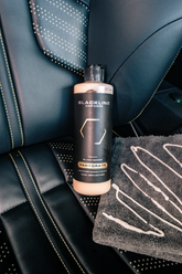 Blackline Car Care BLACKLINE® Rehydrate Leather Conditioner bottle, a leather conditioner for car seats and upholstery.