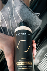 Blackline Car Care BLACKLINE® Rehydrate Leather Conditioner bottle for cleaning and restoring leather car seats and interiors.