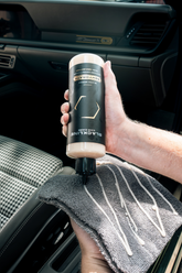 Blackline Car Care BLACKLINE® Rehydrate Leather Conditioner bottle, designed for restoring and conditioning leather surfaces.