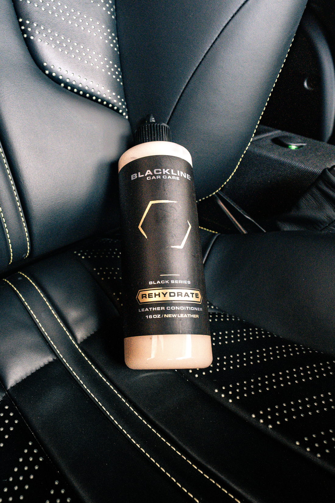 Blackline Car Care BLACKLINE® Rehydrate Leather Conditioner bottle, leather conditioner for car seats and interiors