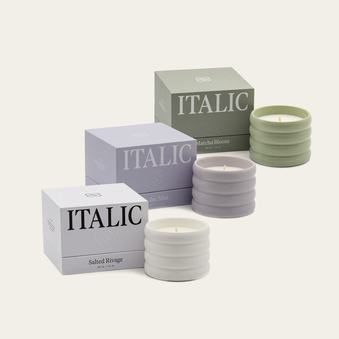 Three soy wax ceramic candles in minimalist containers, featuring natural, warm-toned designs by Italic.