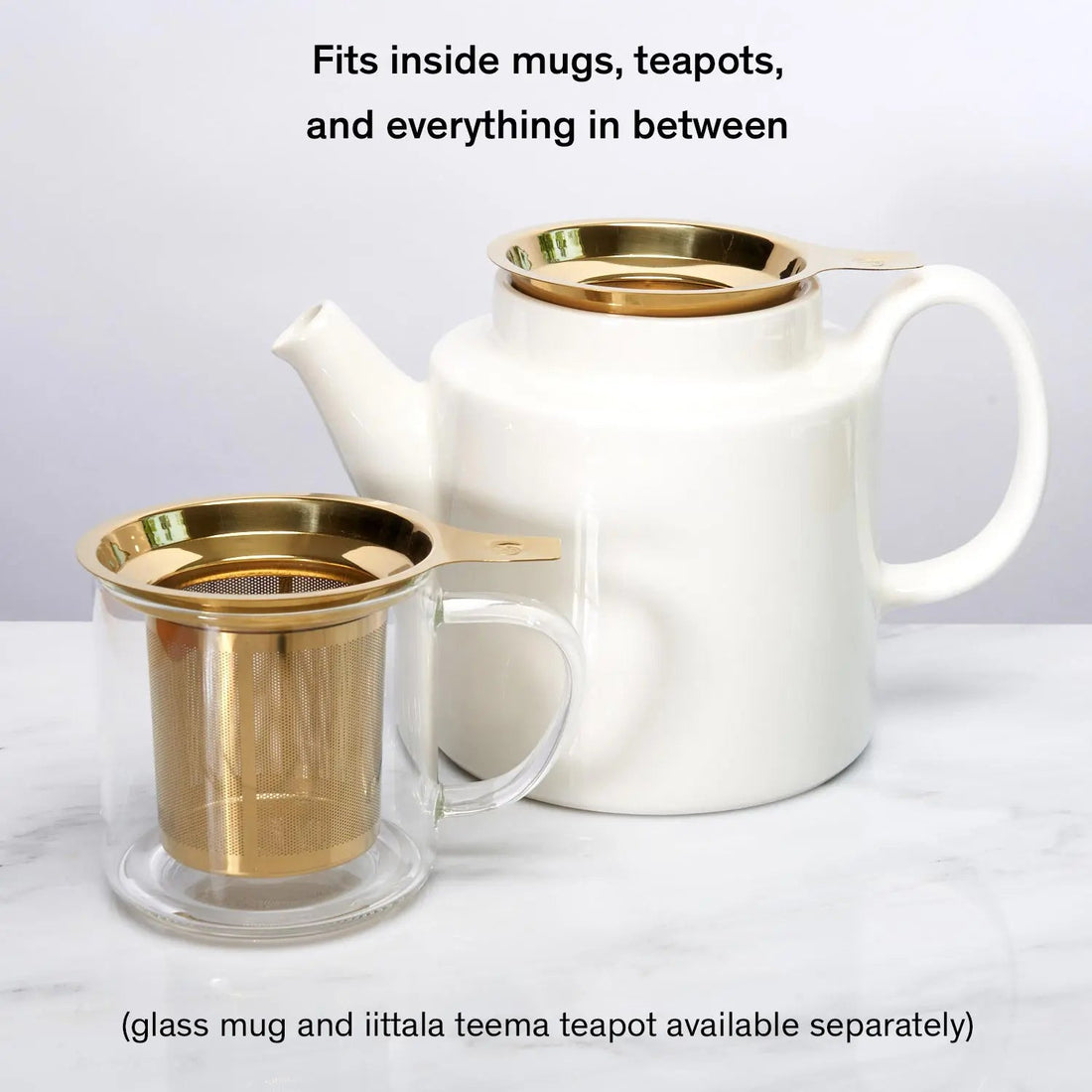 August Uncommon Tea One Cup Infuser in gold with a teapot and mug, perfect for brewing loose leaf tea easily.