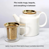 August Uncommon Tea One Cup Infuser in gold with a teapot and mug, perfect for brewing loose leaf tea easily.