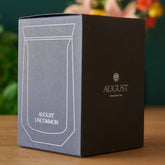 August Uncommon Tea tasting glass for tea, showcasing a sleek, clear glass teaware designed for a refined drinking experience.
