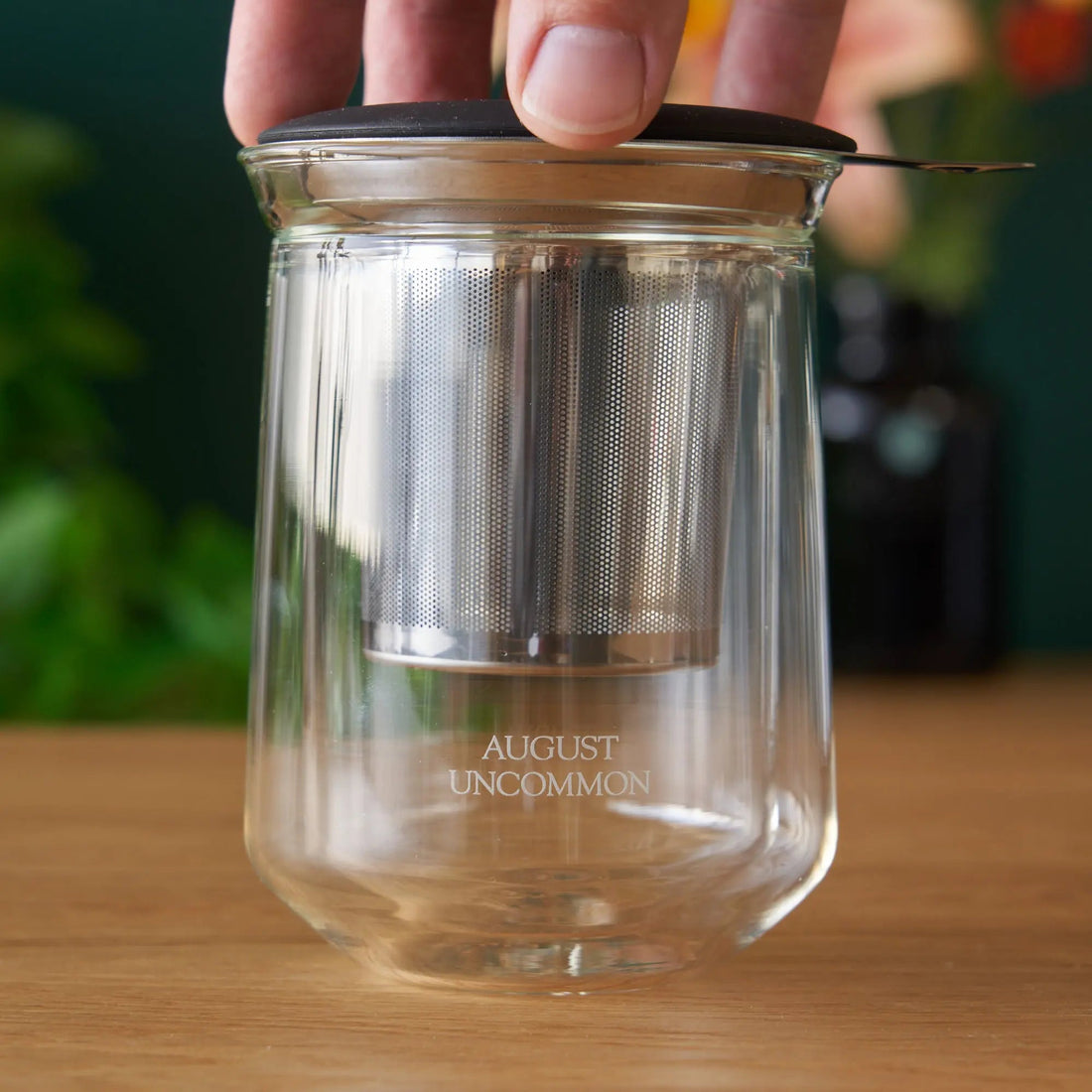 Elegant tasting glass by August Uncommon Tea, designed for refined tea drinking experiences, with clear glass showcasing the beverage.