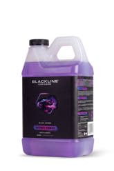 Blackline Car Care BLACKLINE® ULTRA FOAM car shampoo bottle with label and nozzle, ready for washing vehicles.