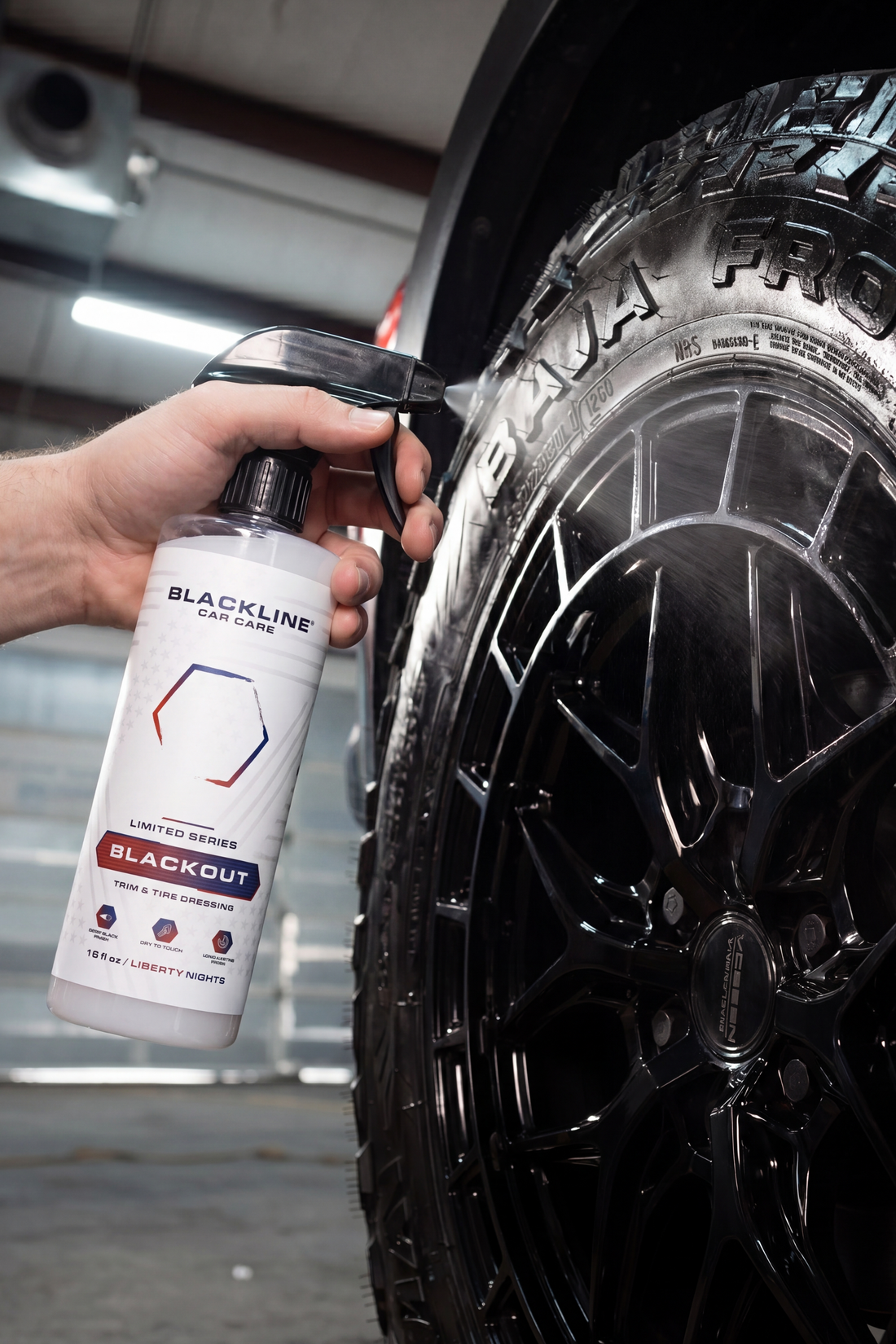 Blackline Car Care BLACKLINE® Blackout Trim and Tire Dressing applied to car tires and trim for a sleek, polished appearance.