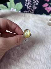 Golden Lepidolite ring from Evermore Everlasting featuring a polished golden purple gemstone set in a sleek silver band.