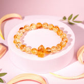 Citrine bracelet from 365 Days of Brilliance by Conscious Items, featuring polished yellow gemstone beads and a silver clasp.