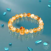Citrine bracelet from the 365 Days of Brilliance collection by Conscious Items, featuring polished yellow gemstone beads.