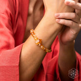 Citrine bracelet from 365 Days of Brilliance by Conscious Items, featuring polished yellow gemstone beads on a stretch cord.
