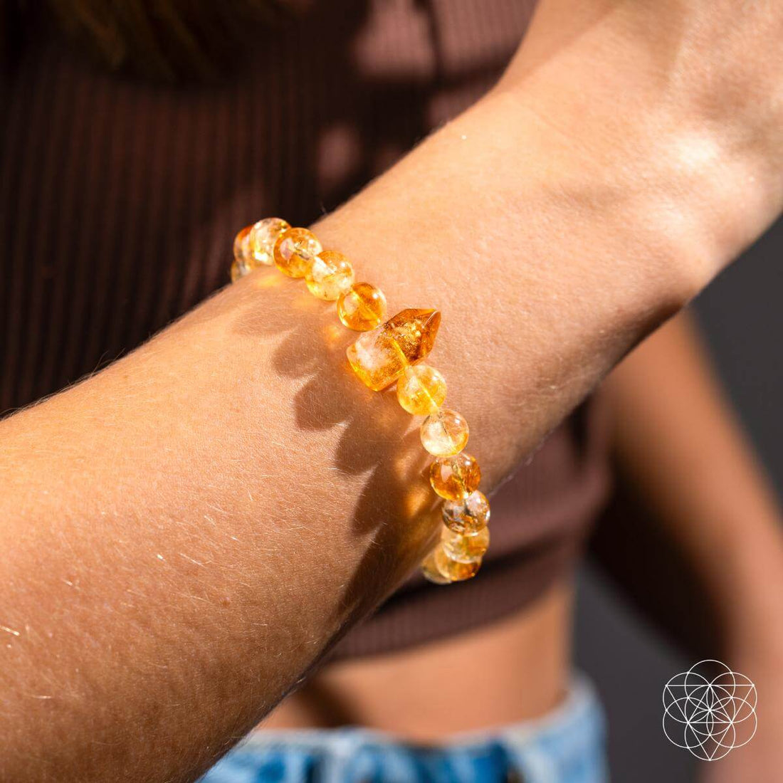 Citrine bracelet from the 365 Days of Brilliance collection by Conscious Items, featuring a gold-tone chain with vibrant citrine stones.