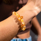 Citrine bracelet from the 365 Days of Brilliance collection by Conscious Items, featuring a gold-tone chain with vibrant citrine stones.