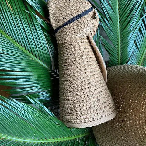Pretty Farm Girl summer hat, stylish wide-brim accessory for sun protection, made of lightweight fabric with decorative band.