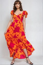 Vibrant Fire Floral high-low maxi dress by Fitkitty Culture featuring bold floral pattern and flowing fabric for stylish wear