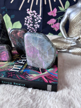 Natural sunset Labradorite freeform gemstone by Evermore Everlasting showing iridescent colors and smooth, polished surface.