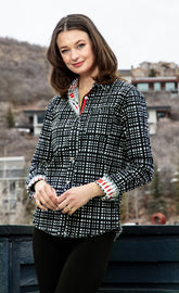 Black and white grid shirt by Dizzy-Lizzie, featuring a classic pattern and button-up style.