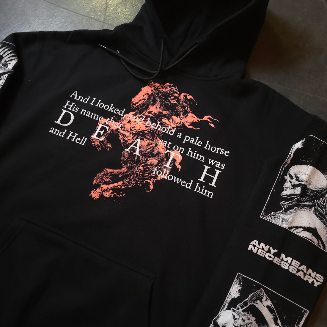 Black 4 Horsemen Pullover Hoodie by Any Means Necessary Clothing, front close view showing design and comfortable fabric.