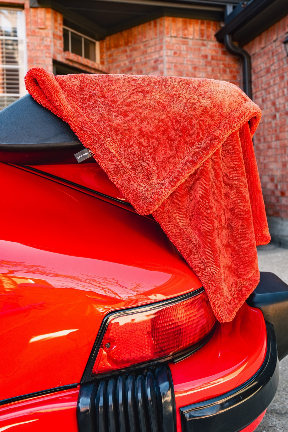 Blackline Car Care BLACKLINE® Twisted-Loop Drying Towel, a soft, absorbent microfiber drying towel for vehicle cleaning.