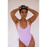 Lavender Angelina One Piece swimsuit by Beau Swim, featuring a stylish design and comfortable fit for beach and pool wear.