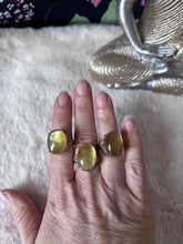 Golden Lepidolite ring from Evermore Everlasting featuring a polished golden-lilac gemstone set in a sleek silver band.