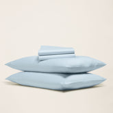 Smooth Luxe Australian Sateen Sheet Set by Italic, featuring soft, glossy bedding with elegant folds and a luxurious finish.