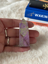 Evermore Everlasting Atlantisite Stichtite crystal tower showing vibrant green and purple mineral formations on a polished stone base.