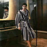 Unisex Ultraplush Australian Cotton bathrobe by Italic, soft white fabric with a relaxed fit and shawl collar.