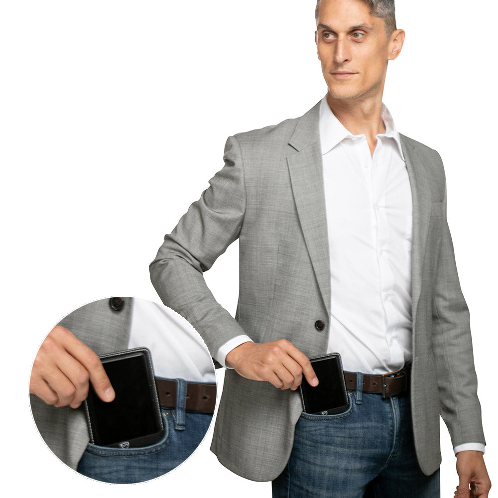 Shield Your Body SYB Phone Shield for iPhones and Android blocks EMF and 5G signals, shown in a man&