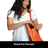 Shield Your Body SYB Phone Shield EMF and 5G blocker for iPhones and Android, shown in a purse-sized mobile phone accessory.