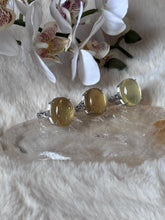 Golden Lepidolite ring from Evermore Everlasting featuring a polished gemstone set in a delicate metal band.