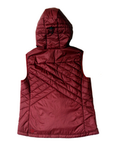 Goal Five Powerstripe eco-friendly down hooded vest in lifestyle setting, showcasing the sleek design and hood detail.