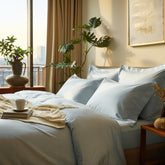 Soft Luxe Australian Sateen Sheet Set from Italic, featuring smooth, shiny sateen fabric on a neatly made bed with pillows.
