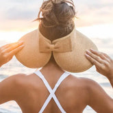 Pretty Farm Girl summer hat, stylish wide-brim accessory with woven straw design for sun protection and fashion.