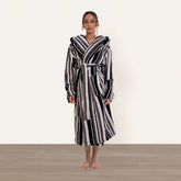 Unisex Ultraplush Australian Cotton bathrobe by Italic, soft, plush fabric with a relaxed fit and tie waist, displayed on a hanger.