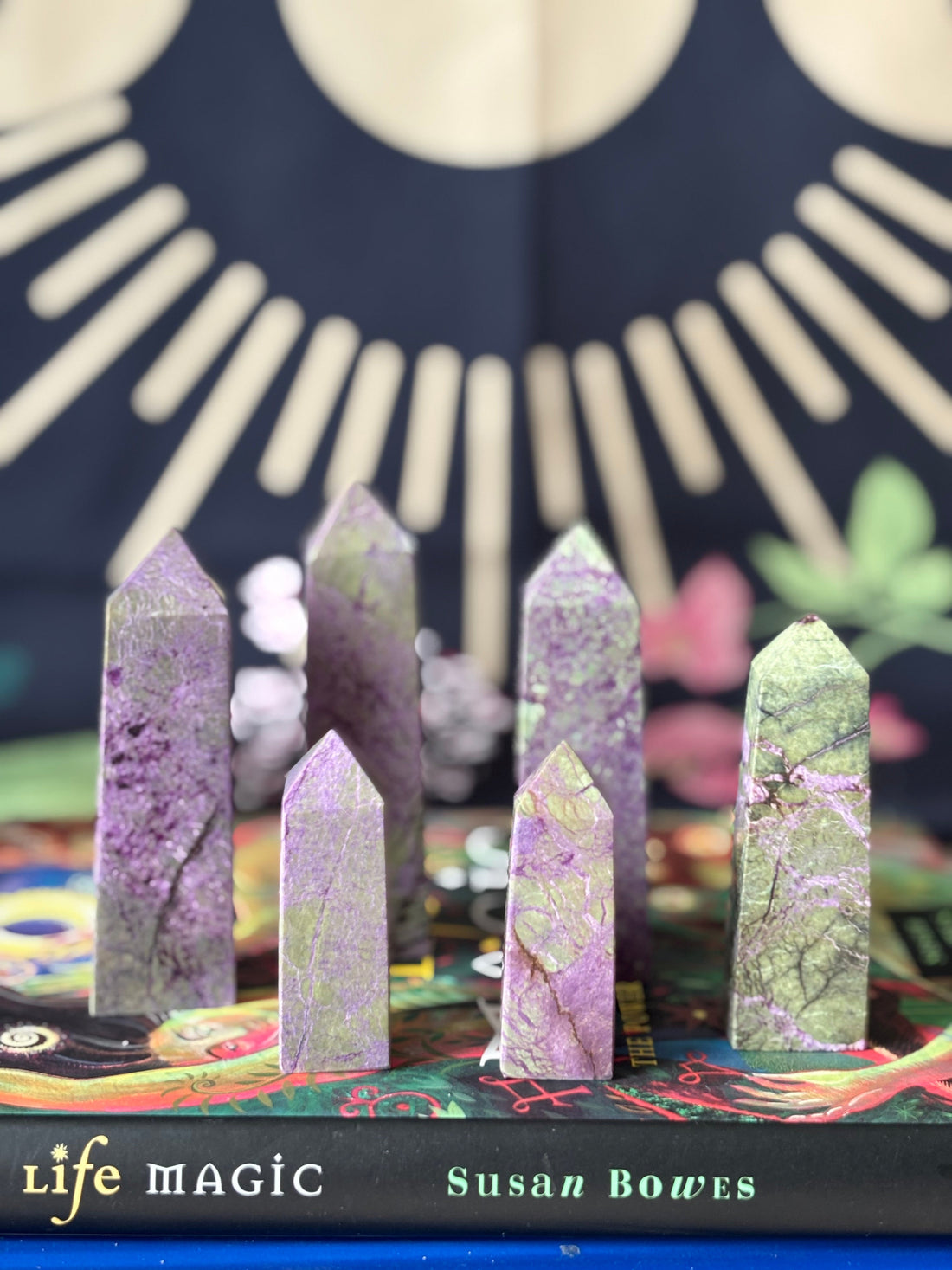 Evermore Everlasting Atlantisite Stichtite crystal tower with rich green and purple hues, polished stone shape, and intricate natural patterns.