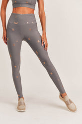 Copper-colored high waisted leggings from Fitkitty Culture, made for yoga and athleisure wear, shown laid flat on a white background.