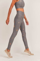 Copper-colored high waisted leggings by Fitkitty Culture, sleek athletic wear for yoga and active lifestyles.