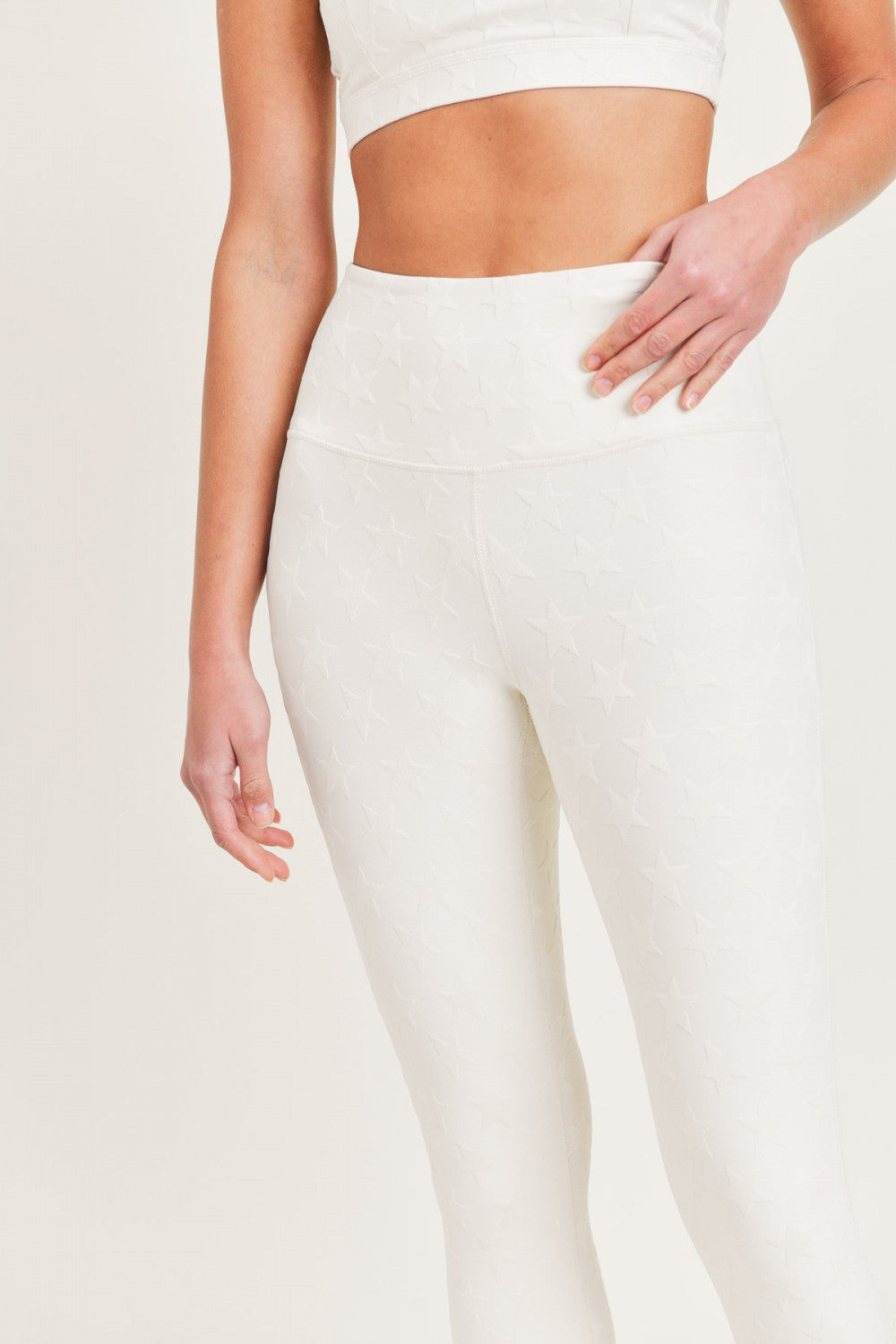 Natural-colored Joystar high waist leggings by Fitkitty Culture, showing the snug fit and stretchy fabric on a white background.