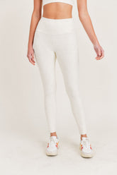 Natural-colored Joystar high waist leggings by Fitkitty Culture, shown on a model highlighting the stretchy, comfortable fit.