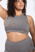 Copper star print Fitkitty Culture sports bra with foil finish, designed for activewear and yoga.