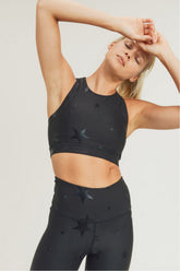 Black foil sports bra by Fitkitty Culture with a sleek design, ideal for yoga and active wear, featuring a supportive fit.