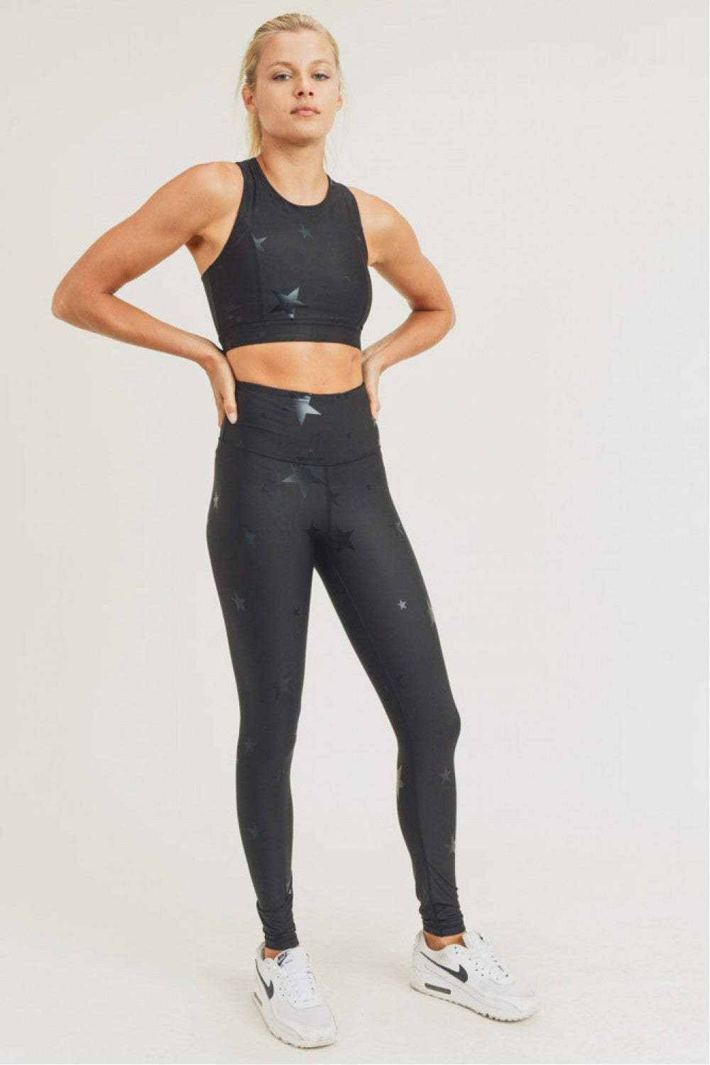 Black Starlight High Waisted Leggings by Fitkitty Culture featuring a star print and foil design, perfect for yoga and athleisure wear.