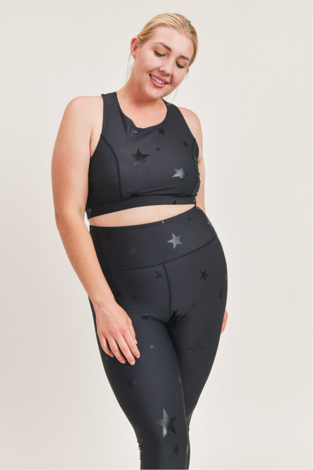 High waisted Starlight leggings by Fitkitty Culture, featuring a starry pattern and stretchy fabric, designed for active wear.